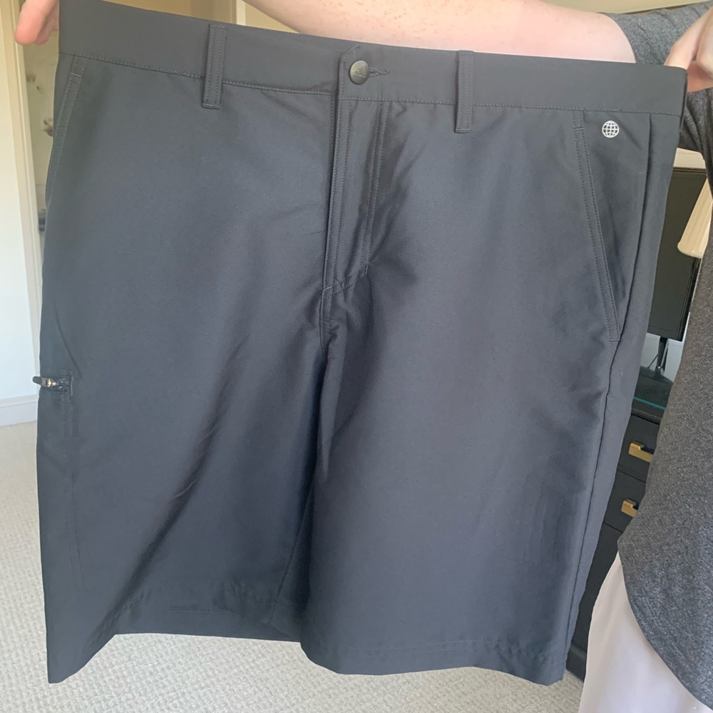 Adidas black golf shorts.